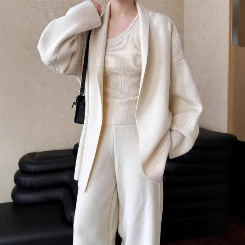 Korean-style Knitted Cardigan Jacket Loose Wide-leg Pants Set Women's Winter Design Sense Irregular Vest Three-piece Set Trendy
Korean-style Knitted Cardigan Jacket Loose Wide-leg Pants Set Women's Winter Design Sense Irregular Vest Three-piece Set Trendy
