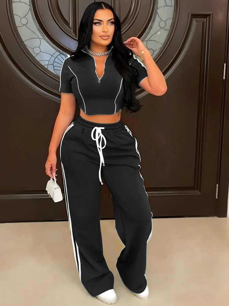 Fashion Casual Two-Piece Set Women's Zipper Short Sleeved Top Paired With Loose Pants
Fashion Casual Two-Piece Set Women's Zipper Short Sleeved Top Paired With Loose Pants