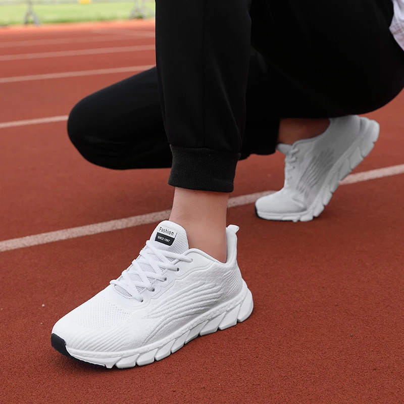 Spring Flying Knitted Breathable Running Shoes Sports Women Casual Shoes Soft Sole Couples Men And Women Small White Shoes
Spring Flying Knitted Breathable Running Shoes Sports Women Casual Shoes Soft Sole Couples Men And Women Small White Shoes