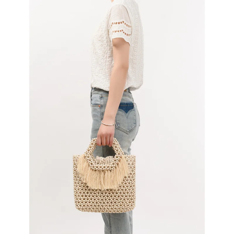 Beach vacation wooden bead bag, ethnic style hand-woven bag, travel tassel handbag
Beach vacation wooden bead bag, ethnic style hand-woven bag, travel tassel handbag