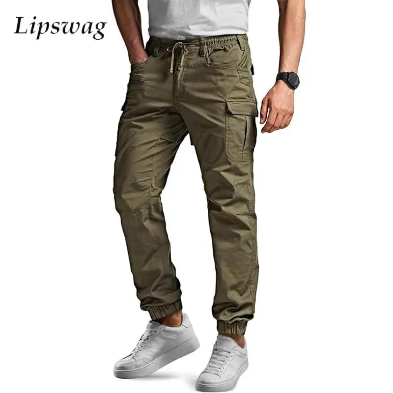 Модные мужские брюки-карго с несколькими карманами, уличные повседневные узкие брюки на шнурке, мужские весенне-осенние винтажные однотонные брюки
Модные мужские брюки-карго с несколькими карманами, уличные повседневные узкие брюки на шнурке, мужские весенне-осенние винтажные однотонные брюки