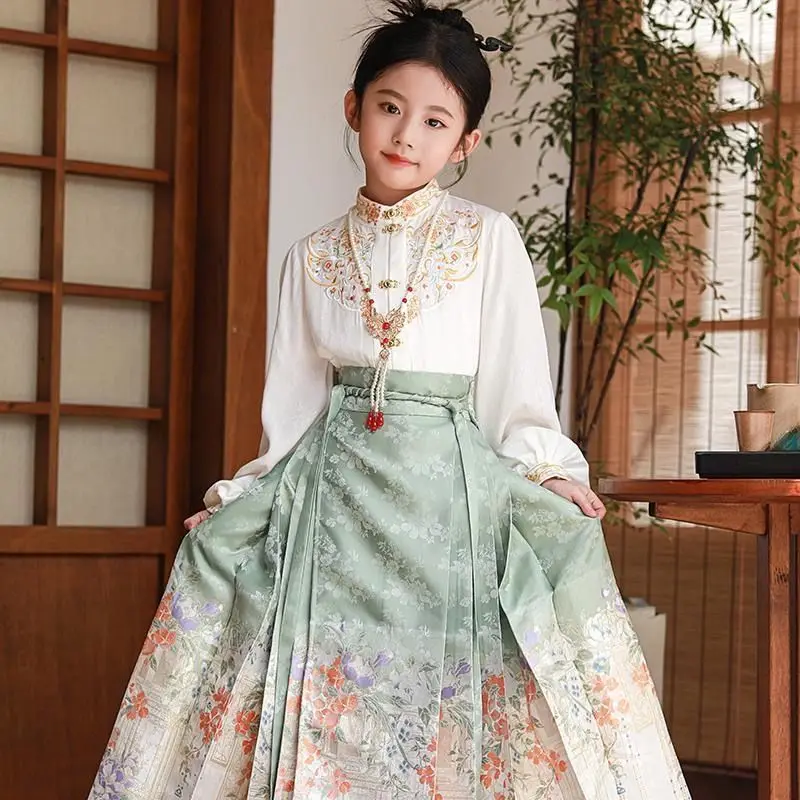 Новый детский костюм Hanfu, комплект Hanfu, комплект с юбкой в китайском стиле Тан для девочек, топ с цветочной вышивкой, комплект с юбкой с конским лицом LH646
Новый детский костюм Hanfu, комплект Hanfu, комплект с юбкой в китайском стиле Тан для девочек, топ с цветочной вышивкой, комплект с юбкой с конским лицом LH646