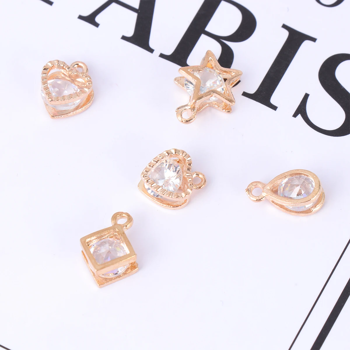1 Set of 20pcs DIY Pendants Alloy Zircon Inlaid Hollow Pendants Jewelry Making Accessories (Random Pattern)
1 Set of 20pcs DIY Pendants Alloy Zircon Inlaid Hollow Pendants Jewelry Making Accessories (Random Pattern)