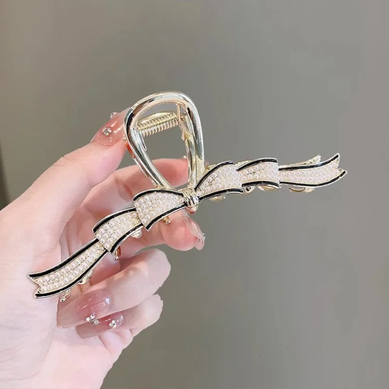 2023 Pearl Bow Metal Hair Claw Fashion Geometric Hair Clips Hairpins Shark Clip Headwear For Women Girl Hair Accessories
2023 Pearl Bow Metal Hair Claw Fashion Geometric Hair Clips Hairpins Shark Clip Headwear For Women Girl Hair Accessories