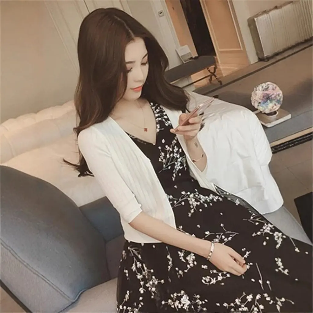 Women's Summer Shawl Sleeveless Knitted Small Cardigan Ice Silk Sunscreen Outer Top Blouse Thin Skirt Sling Short Coat
Women's Summer Shawl Sleeveless Knitted Small Cardigan Ice Silk Sunscreen Outer Top Blouse Thin Skirt Sling Short Coat