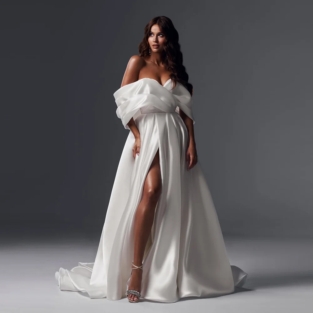 Customized Modest Off-Shoulder Satin Pleated Wedding Dress Backless Side High Split Court Wedding Bridal Gown
Customized Modest Off-Shoulder Satin Pleated Wedding Dress Backless Side High Split Court Wedding Bridal Gown