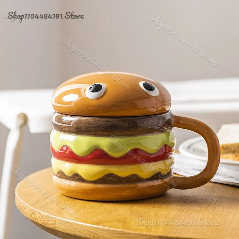 2025 New Creative Hamburger Mug Breakfast Oatmeal Milk Cup with Lid Home Afternoon Tea Coffee Cup Ceramic Drinking Set Gifts
2025 New Creative Hamburger Mug Breakfast Oatmeal Milk Cup with Lid Home Afternoon Tea Coffee Cup Ceramic Drinking Set Gifts