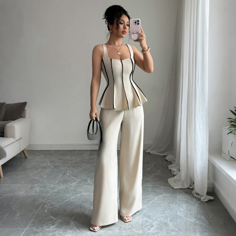 European and American Temperament Elegant Wind Sling Vest Solid Color Trousers Suit Women's Clothing Summer Comfortable Fashion
European and American Temperament Elegant Wind Sling Vest Solid Color Trousers Suit Women's Clothing Summer Comfortable Fashion