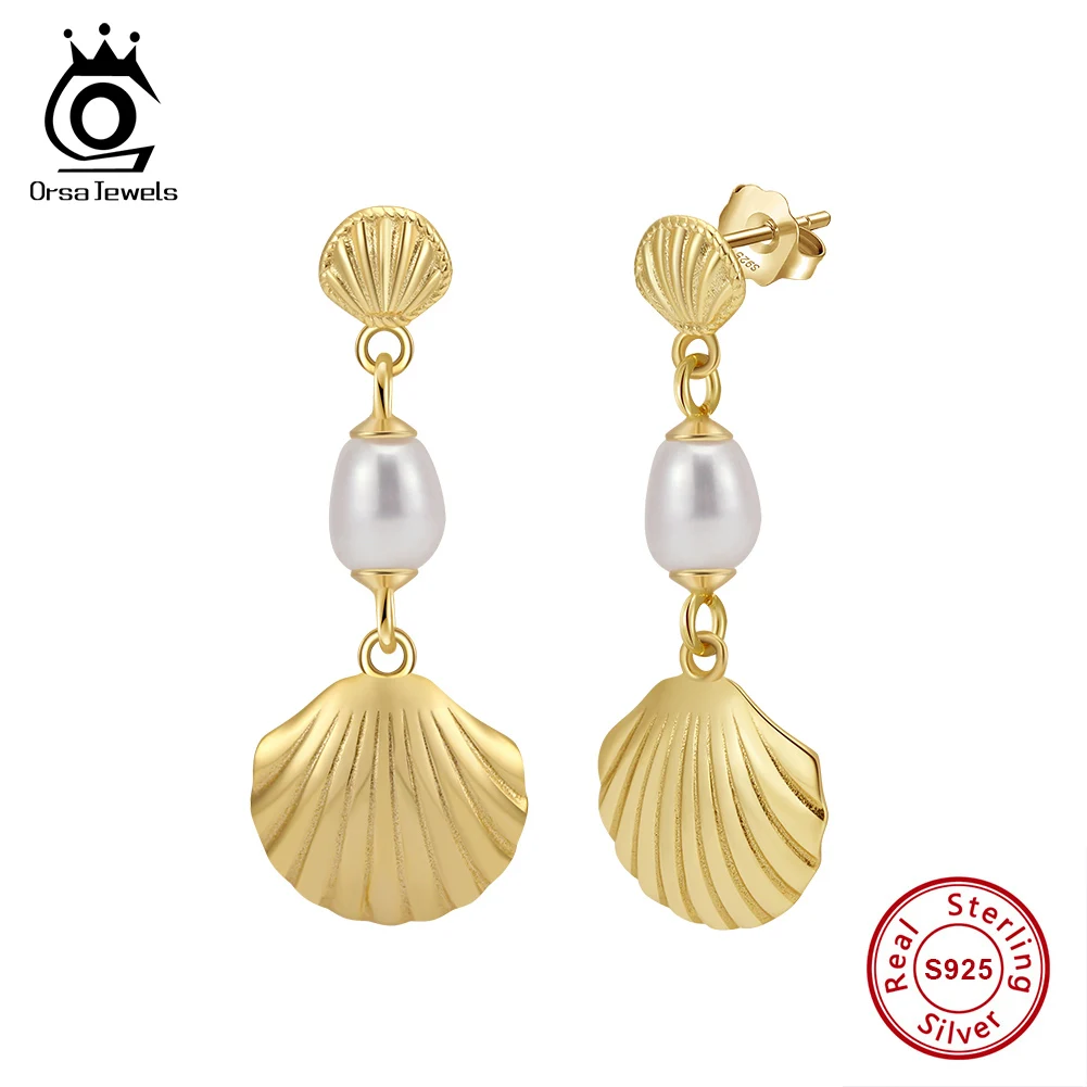 ORSA JEWELS новые изысканные серьги-капли в форме ракушки и морской звезды, стерлинговое серебро 925 пробы, висячие серьги с пресноводным жемчугом, ожерелье для вечеринки GPE114
ORSA JEWELS новые изысканные серьги-капли в форме ракушки и морской звезды, стерлинговое серебро 925 пробы, висячие серьги с пресноводным жемчугом, ожерелье для вечеринки GPE114