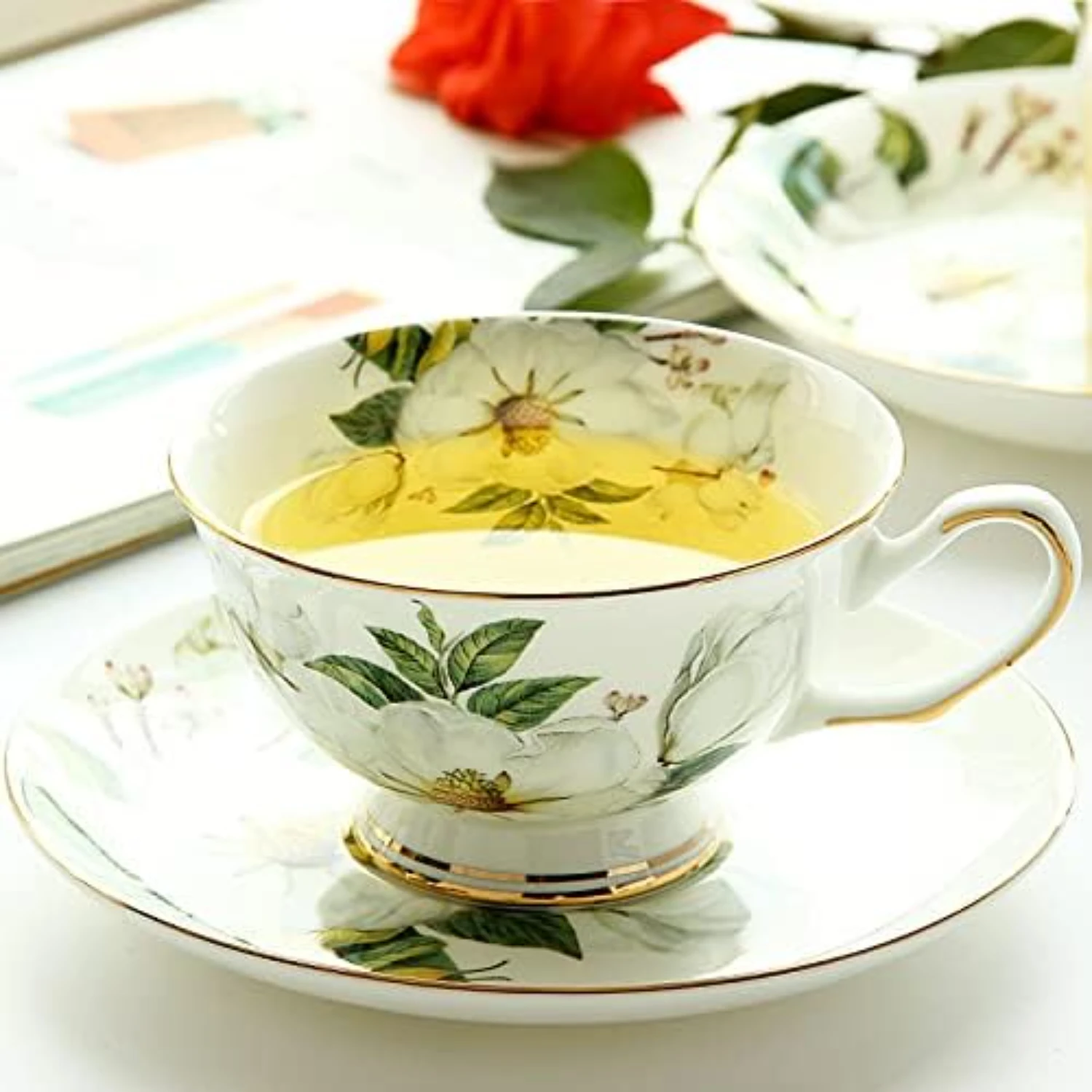 Beautiful and elegant ceramic tea cup set with saucer - Stunning high-quality design in vibrant colors - Exquisite camellia patt
Beautiful and elegant ceramic tea cup set with saucer - Stunning high-quality design in vibrant colors - Exquisite camellia patt