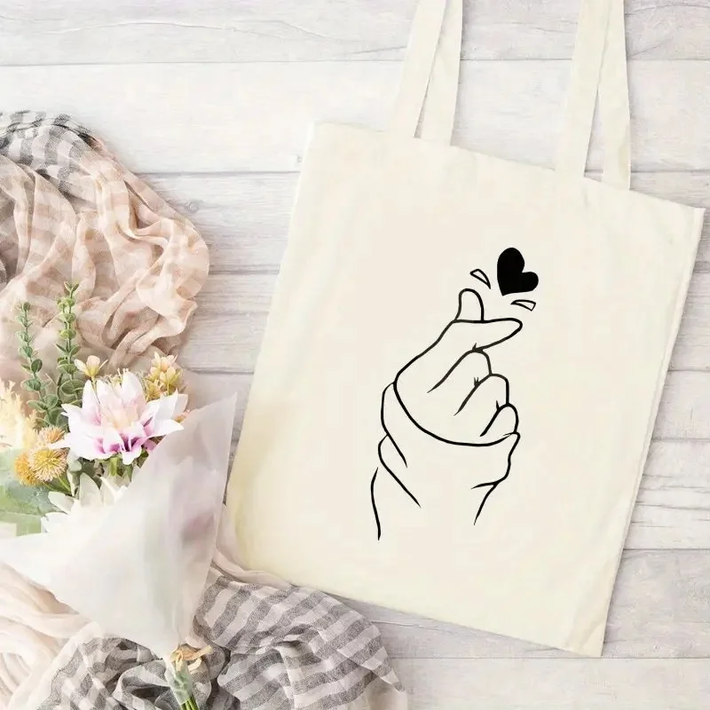 Korean Finger Heart Canvas Tote Bag Minimalist Line Art Print Shoulder Bag Reusable Eco Friendly Tote for Kpop Fans
Korean Finger Heart Canvas Tote Bag Minimalist Line Art Print Shoulder Bag Reusable Eco Friendly Tote for Kpop Fans