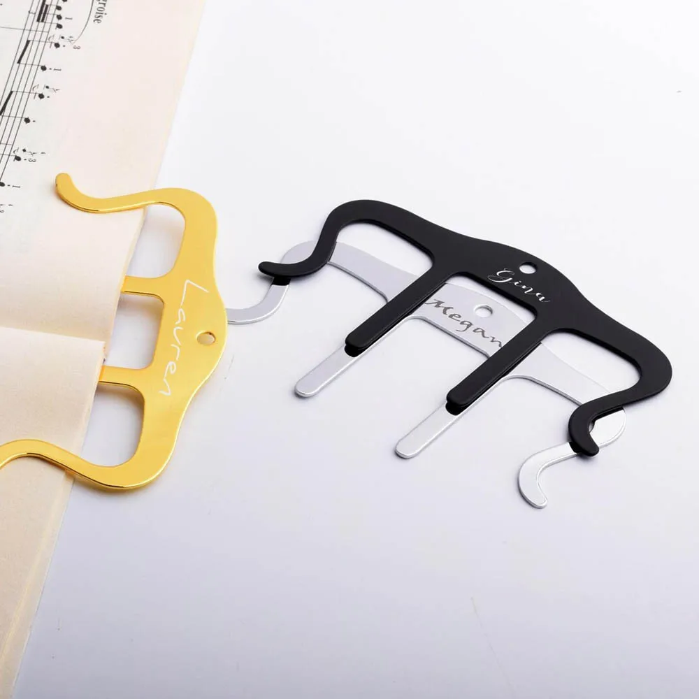 One stainless steel metal music score bookmark holder convenient for carrying creative piano stand for collection and as a gift
One stainless steel metal music score bookmark holder convenient for carrying creative piano stand for collection and as a gift