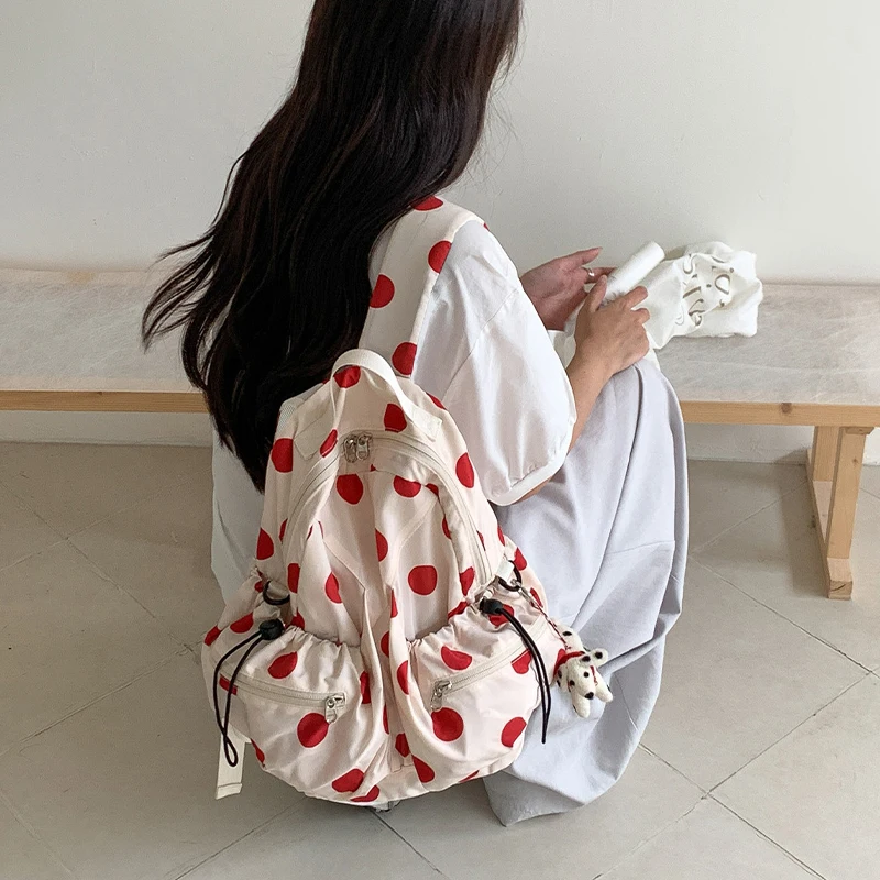 Fashion Lightweight Student SchoolBag Niche Polka Dot Women Large Capacity Multi Pocket Solid Color Casual Backpack
Fashion Lightweight Student SchoolBag Niche Polka Dot Women Large Capacity Multi Pocket Solid Color Casual Backpack