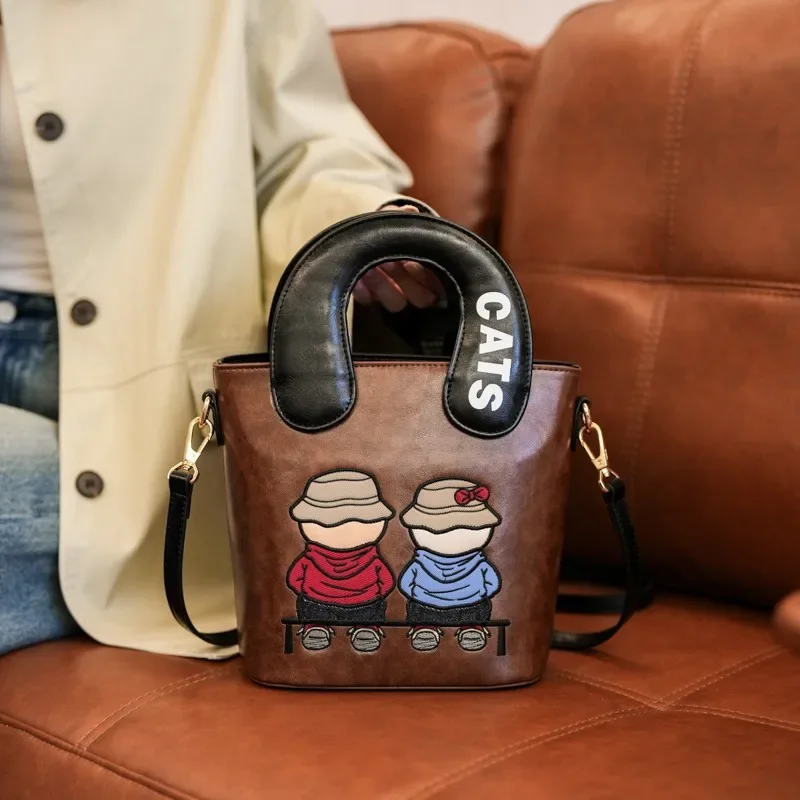 2025 New Women's Cartoon Bear Bucket Bag - Contrasting Color, Versatile, Portable Shoulder/Crossbody for Commute
2025 New Women's Cartoon Bear Bucket Bag - Contrasting Color, Versatile, Portable Shoulder/Crossbody for Commute