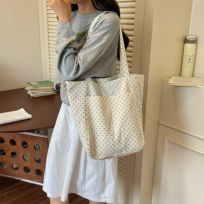 Korean Casual Chic Polka Dot Canvas Tote Bag Artistic Work Commuting Multi-Way Handbag Shoulder Bag
Korean Casual Chic Polka Dot Canvas Tote Bag Artistic Work Commuting Multi-Way Handbag Shoulder Bag