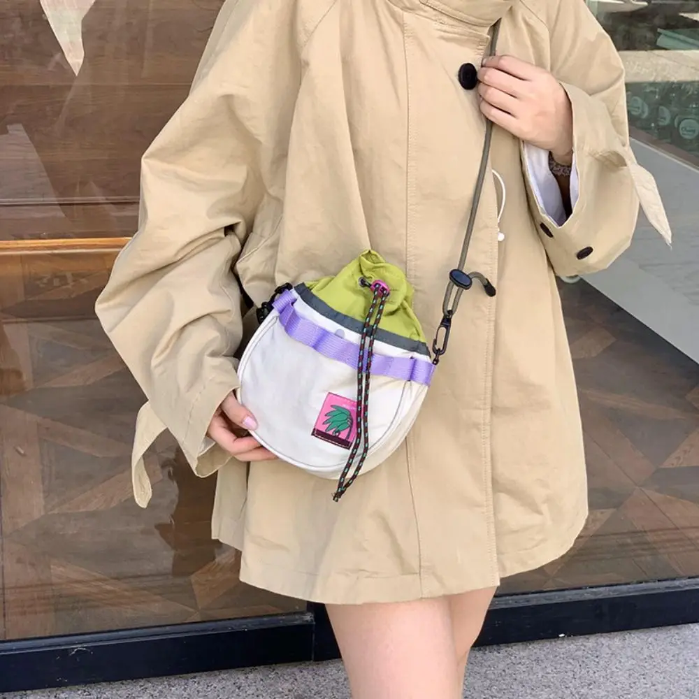Lightweight Drawstring Mini Shoulder Bag Adjustable Strap Zipper Small Nylon Bucket Bag Korean Style Patchwork
Lightweight Drawstring Mini Shoulder Bag Adjustable Strap Zipper Small Nylon Bucket Bag Korean Style Patchwork