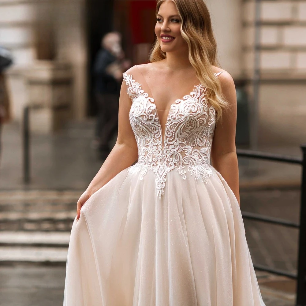 Classic Tulle Wedding Dresses Plus Size V Neck Sleeveless Bridal Gowns Applique Pearls Floor Length A-Line Vestidos De Novia
Classic Tulle Wedding Dresses Plus Size V Neck Sleeveless Bridal Gowns Applique Pearls Floor Length A-Line Vestidos De Novia