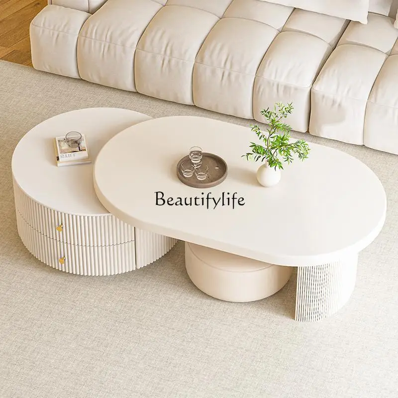 Solid wood retractable coffee table household small apartment new oval high-end tea table
Solid wood retractable coffee table household small apartment new oval high-end tea table