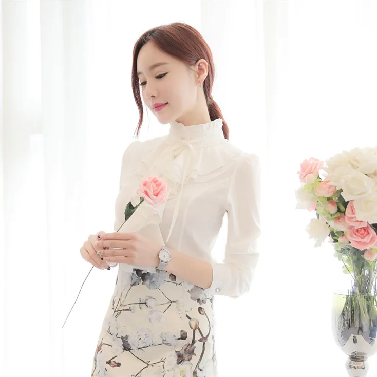 Весенне-осенняя женская белая шифоновая рубашка с кукольным воротником и длинными рукавами в корейском стиле, облегающая базовая блузка для женщин JJ292
Весенне-осенняя женская белая шифоновая рубашка с кукольным воротником и длинными рукавами в корейском стиле, облегающая базовая блузка для женщин JJ292