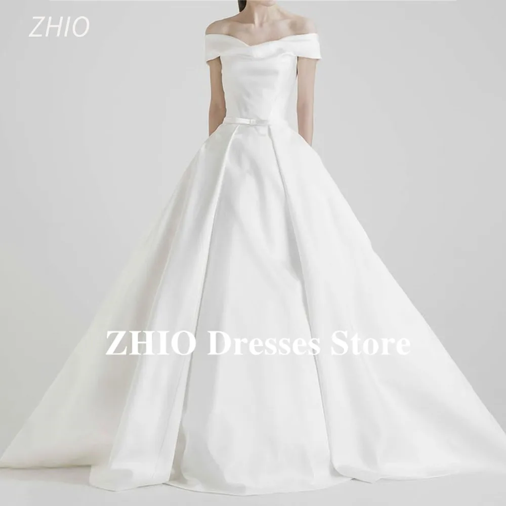 ZHIO Elegant Off Shoulder Princess Korea Wedding Dress A-Line Bow Ribbon Photo Shoot Bridal Reception Gown Customized 웨딩드레스
ZHIO Elegant Off Shoulder Princess Korea Wedding Dress A-Line Bow Ribbon Photo Shoot Bridal Reception Gown Customized 웨딩드레스