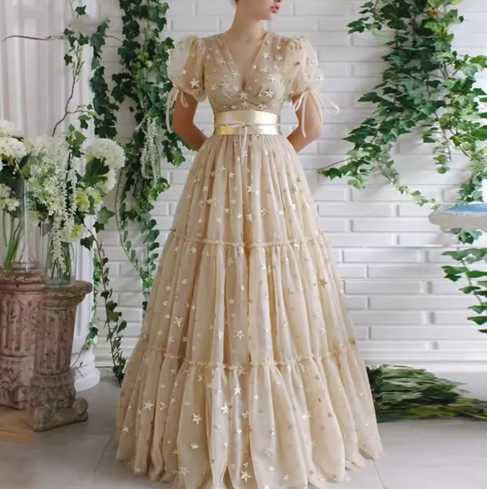 Champagne Sweet Elegant Prom Dresses V Neck Bow Waistband Star Sequins Tulle A-Line Women Homecoming Party Gown Customized
Champagne Sweet Elegant Prom Dresses V Neck Bow Waistband Star Sequins Tulle A-Line Women Homecoming Party Gown Customized