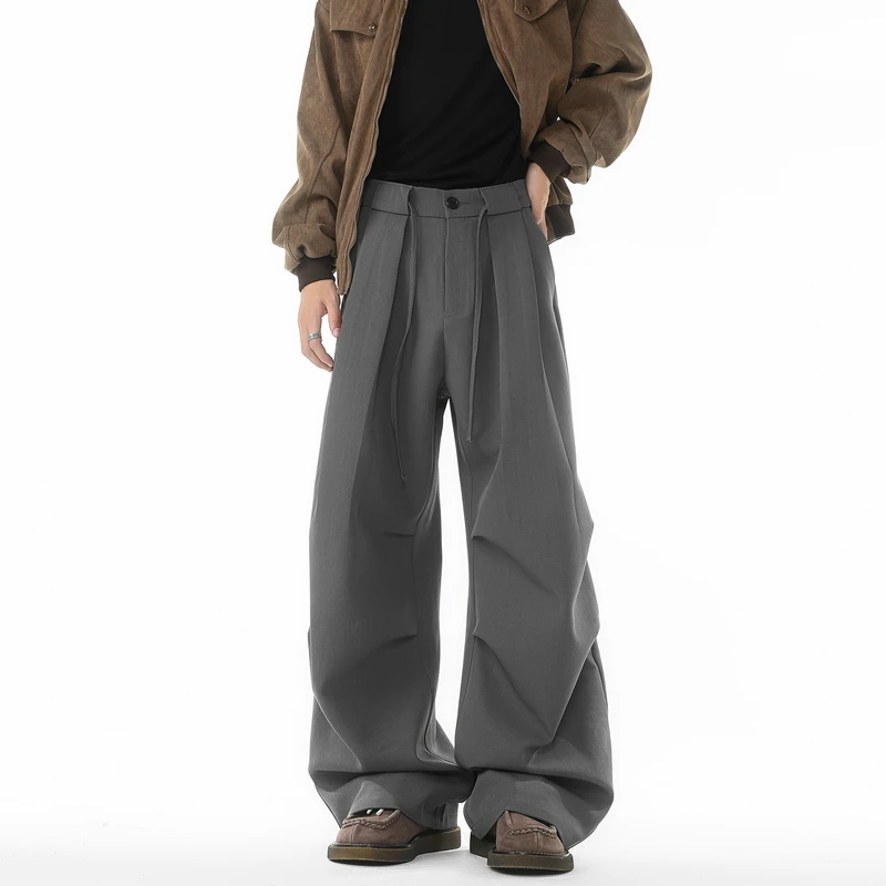 Серые костюмные брюки Мужская мода Общество Мужские черные классические брюки Корейские свободные широкие брюки Мужские офисные официальные брюки размера плюс 
Серые костюмные брюки Мужская мода Общество Мужские черные классические брюки Корейские свободные широкие брюки Мужские офисные официальные брюки размера плюс