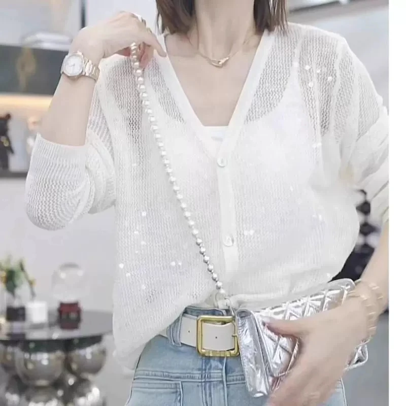 Sequin Hollow Thin Knitted Sweater Women's Summer 2025 New Loose Chic Cardigan Outer Wear Sun Protection Shawl Coat Female Y2K
Sequin Hollow Thin Knitted Sweater Women's Summer 2025 New Loose Chic Cardigan Outer Wear Sun Protection Shawl Coat Female Y2K