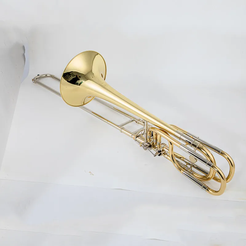 Vincent Bach Grade Gold lacquer brass body Bass Bb/F/Gb/D Trombone
Vincent Bach Grade Gold lacquer brass body Bass Bb/F/Gb/D Trombone