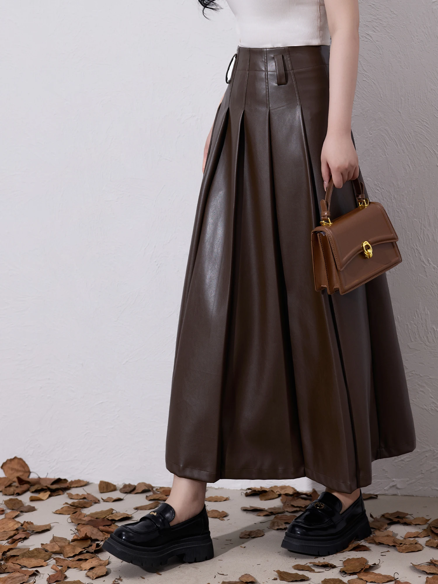 Юбка миди из искусственной кожи для полных женщин, кофейного цвета, приталенная, А-силуэт, с высокой талией, готовая к носке на каждый день
Юбка миди из искусственной кожи для полных женщин, кофейного цвета, приталенная, А-силуэт, с высокой талией, готовая к носке на каждый день