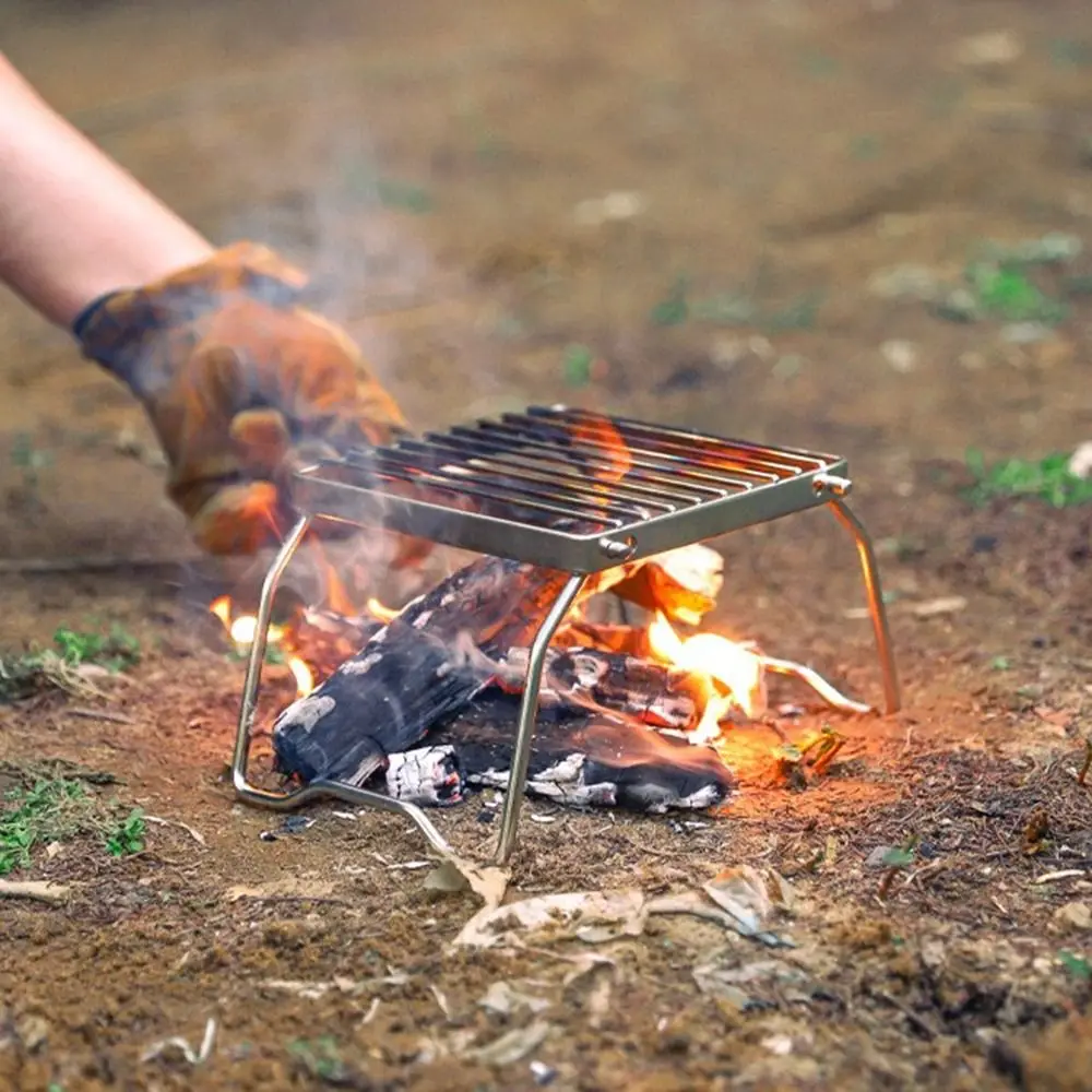 Safe Portable Mini BBQ Grill Rack Adjustable Durable Folding Grill Rack Heat-resistant Outdoor Grill Burn-er Stand Campfire
Safe Portable Mini BBQ Grill Rack Adjustable Durable Folding Grill Rack Heat-resistant Outdoor Grill Burn-er Stand Campfire