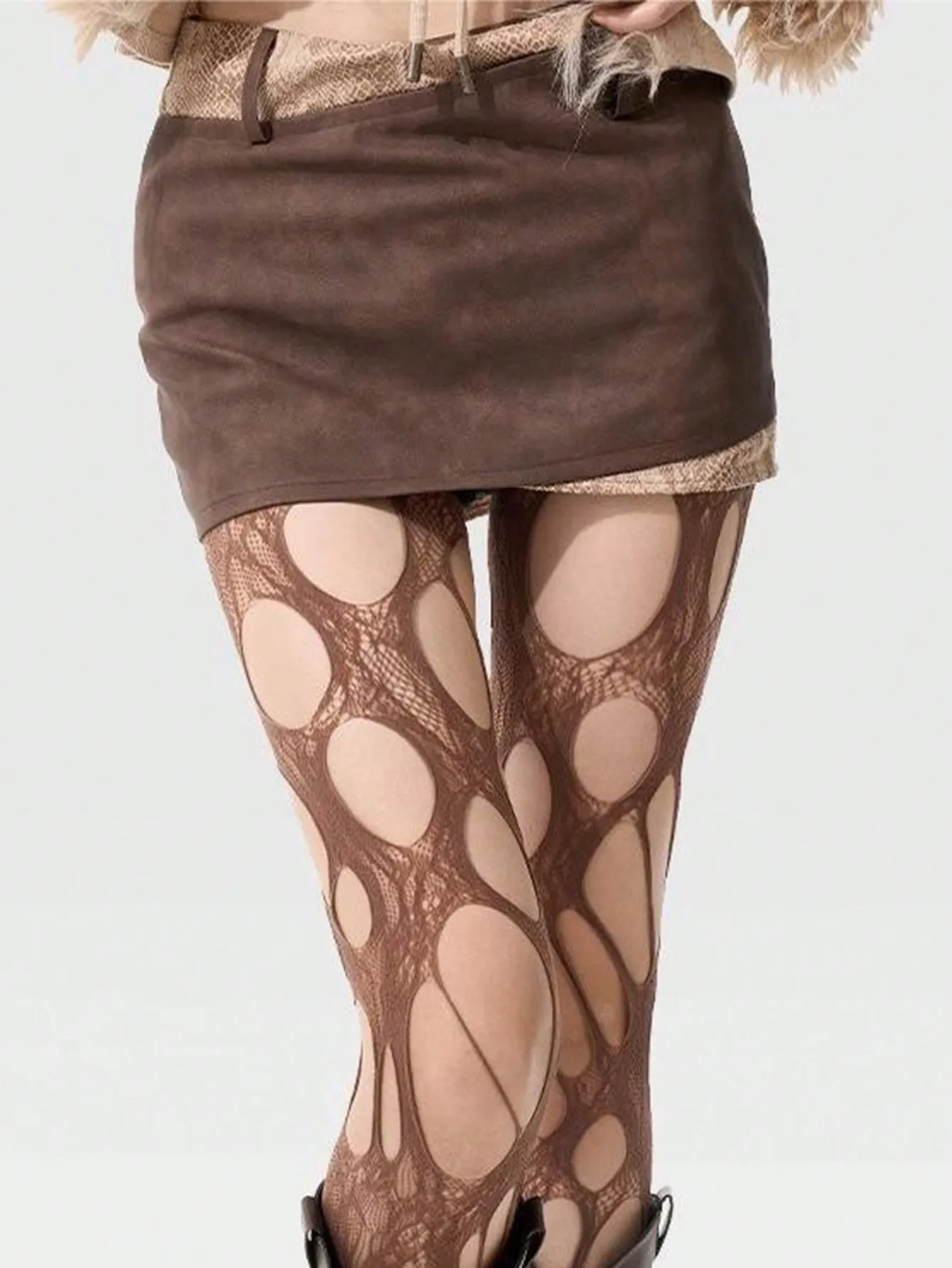 Coffee Brown Asymmetrical Fishnet Tights with Cutout Design for Women, One Size Fits All
Coffee Brown Asymmetrical Fishnet Tights with Cutout Design for Women, One Size Fits All