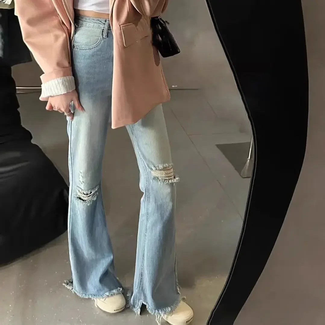 

Broken hole raw edge straight micro flare jeans female high-waisted 2024 spring and summer new hundred drag ground flare pants