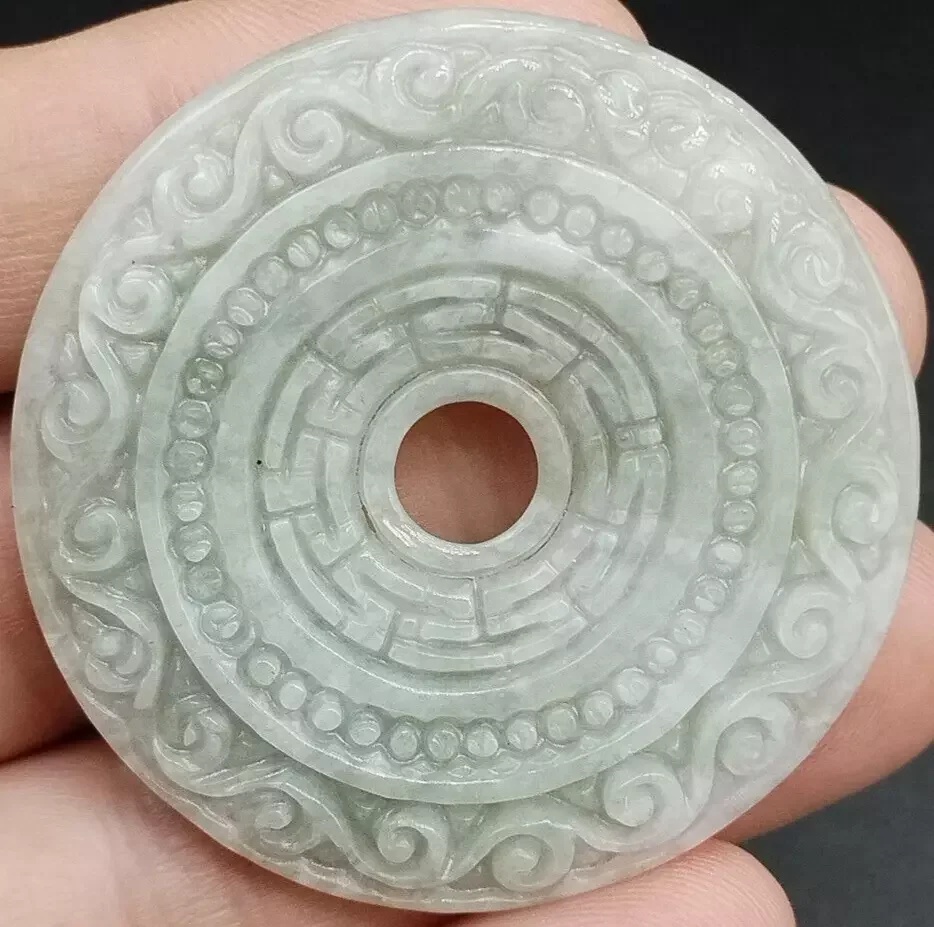 Certified Light Green Natural A Jadeite Carved Moire Safety Circle Donut Pendant
Certified Light Green Natural A Jadeite Carved Moire Safety Circle Donut Pendant