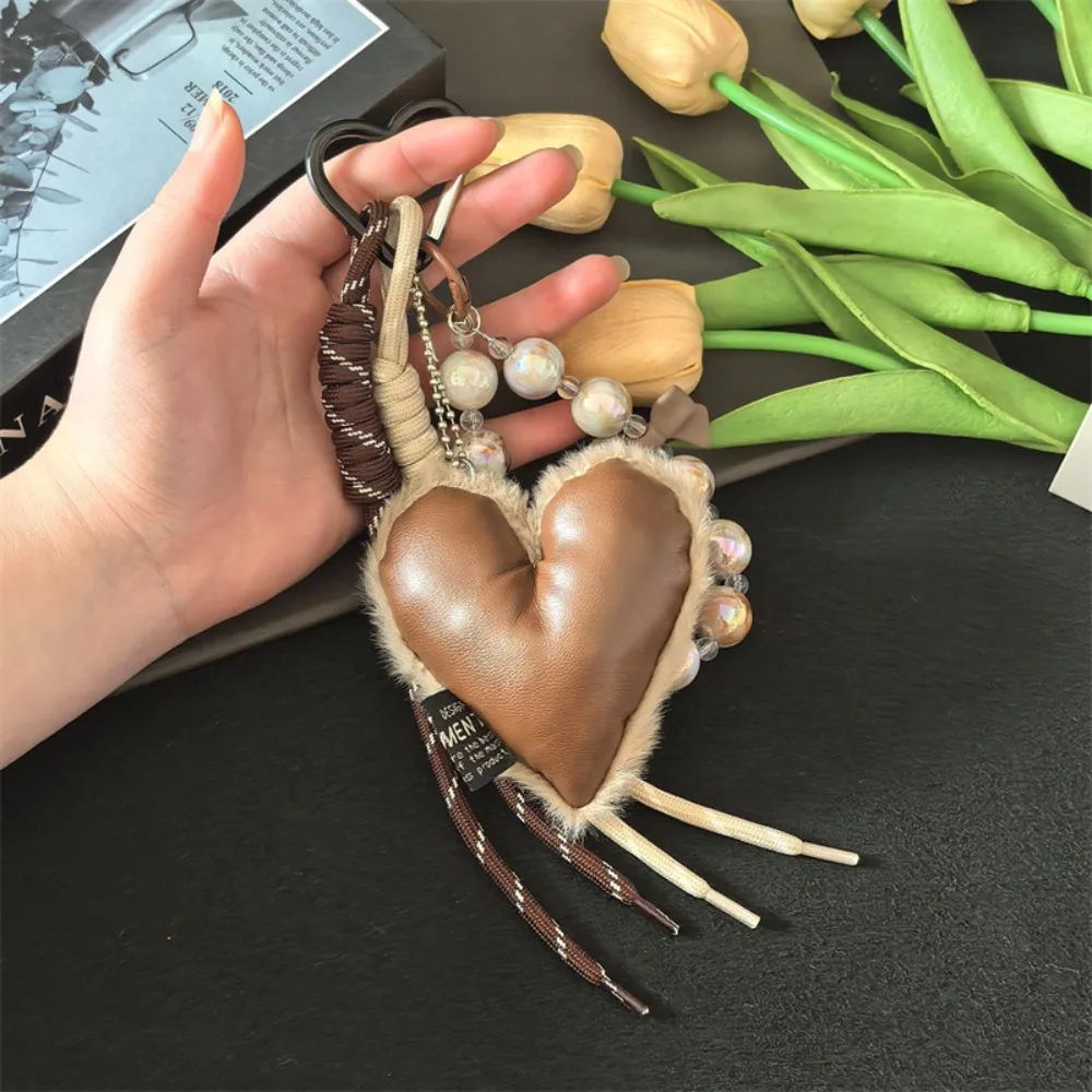 Модный брелок в стиле Майяра, креативный кулон в форме сердца, роскошный брелок с длинной кисточкой, аксессуар для сумки
Модный брелок в стиле Майяра, креативный кулон в форме сердца, роскошный брелок с длинной кисточкой, аксессуар для сумки