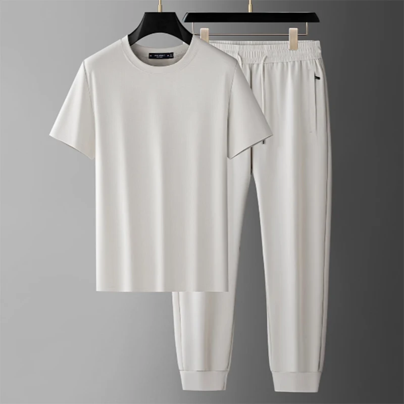 Summer's high-end simple cool ice silk short-sleeve suit skin-friendly breathable men's casual round neck solid color sports sui
Summer's high-end simple cool ice silk short-sleeve suit skin-friendly breathable men's casual round neck solid color sports sui