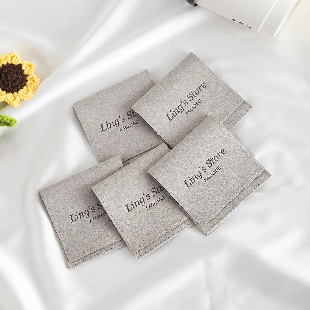 100pcs Custom Stamped logo Printed Luxury Envelope Flap Micro Fiber Suede Microfiber Envelope Jewelry Pouches and Packaging Gift
100pcs Custom Stamped logo Printed Luxury Envelope Flap Micro Fiber Suede Microfiber Envelope Jewelry Pouches and Packaging Gift
