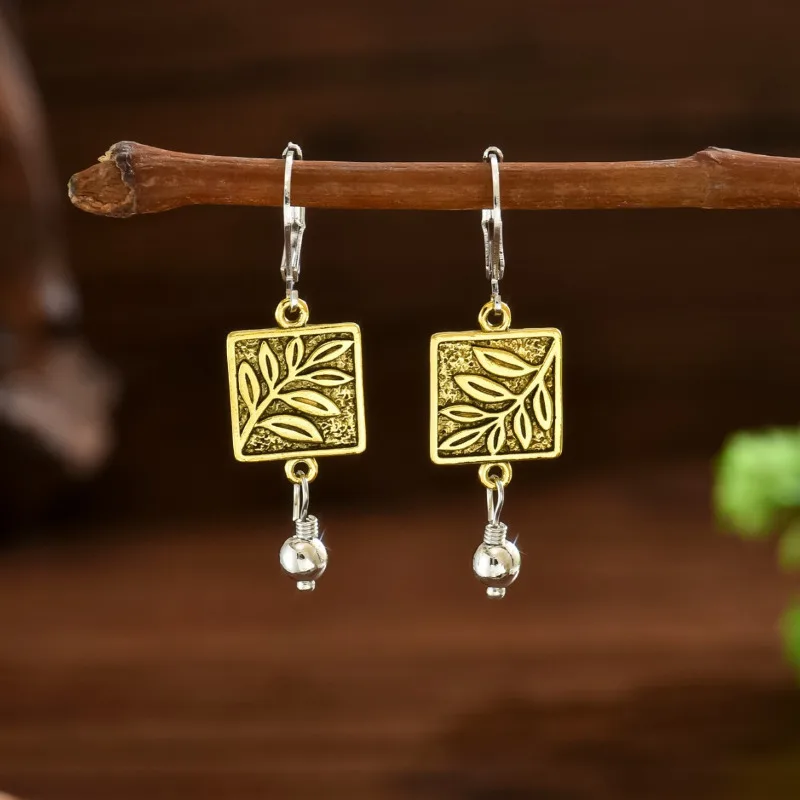 European and American fashion retro creative branches and leaves shape personality simple women's earrings
European and American fashion retro creative branches and leaves shape personality simple women's earrings