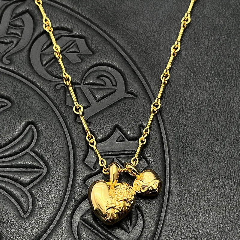 S925 sterling silver trendy jewelry double peach heart pendant necklace niche personality cross
S925 sterling silver trendy jewelry double peach heart pendant necklace niche personality cross