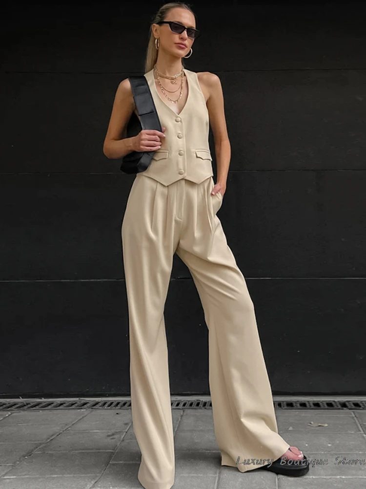 Solid Pleated Pants Suits Women Sleeveless Vest Tops + Wide Leg Pants 2 Pieces Sets Summer 2024 Classic Office Lady Outfits
Solid Pleated Pants Suits Women Sleeveless Vest Tops + Wide Leg Pants 2 Pieces Sets Summer 2024 Classic Office Lady Outfits