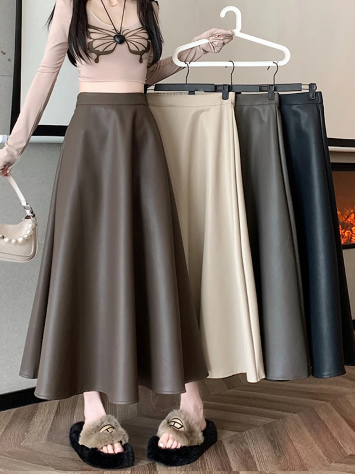 Slim Fit Midi Skirt Women's Spring 2025 New High Waist A-Line PU Leather Long Skirt Casual Versatile Mid-Length Umbrella Skirt
Slim Fit Midi Skirt Women's Spring 2025 New High Waist A-Line PU Leather Long Skirt Casual Versatile Mid-Length Umbrella Skirt
