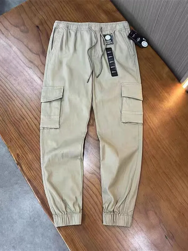 Men's Cotton Khaki Workwear Style Loose Fit Pants with Multiple Pockets Elastic Waist Cargo Trousers Casual Long Trousers
Men's Cotton Khaki Workwear Style Loose Fit Pants with Multiple Pockets Elastic Waist Cargo Trousers Casual Long Trousers