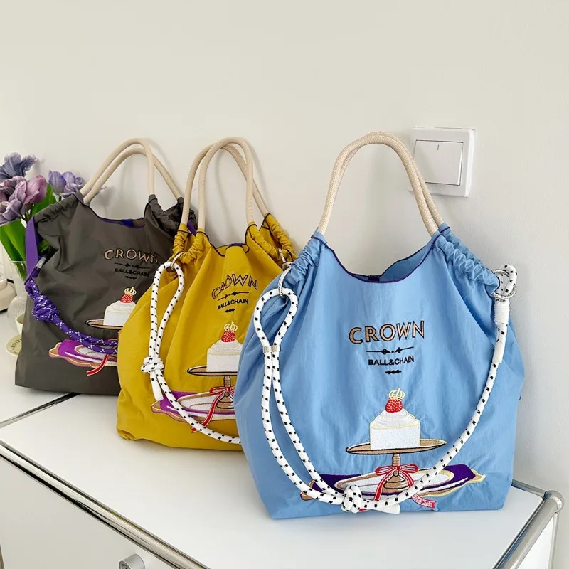 Ball Chain Cartoon Cute Embroidered Eco Friendly Bag Shopping Bag Waterproof Nylon Handheld Shoulder Bag
Ball Chain Cartoon Cute Embroidered Eco Friendly Bag Shopping Bag Waterproof Nylon Handheld Shoulder Bag