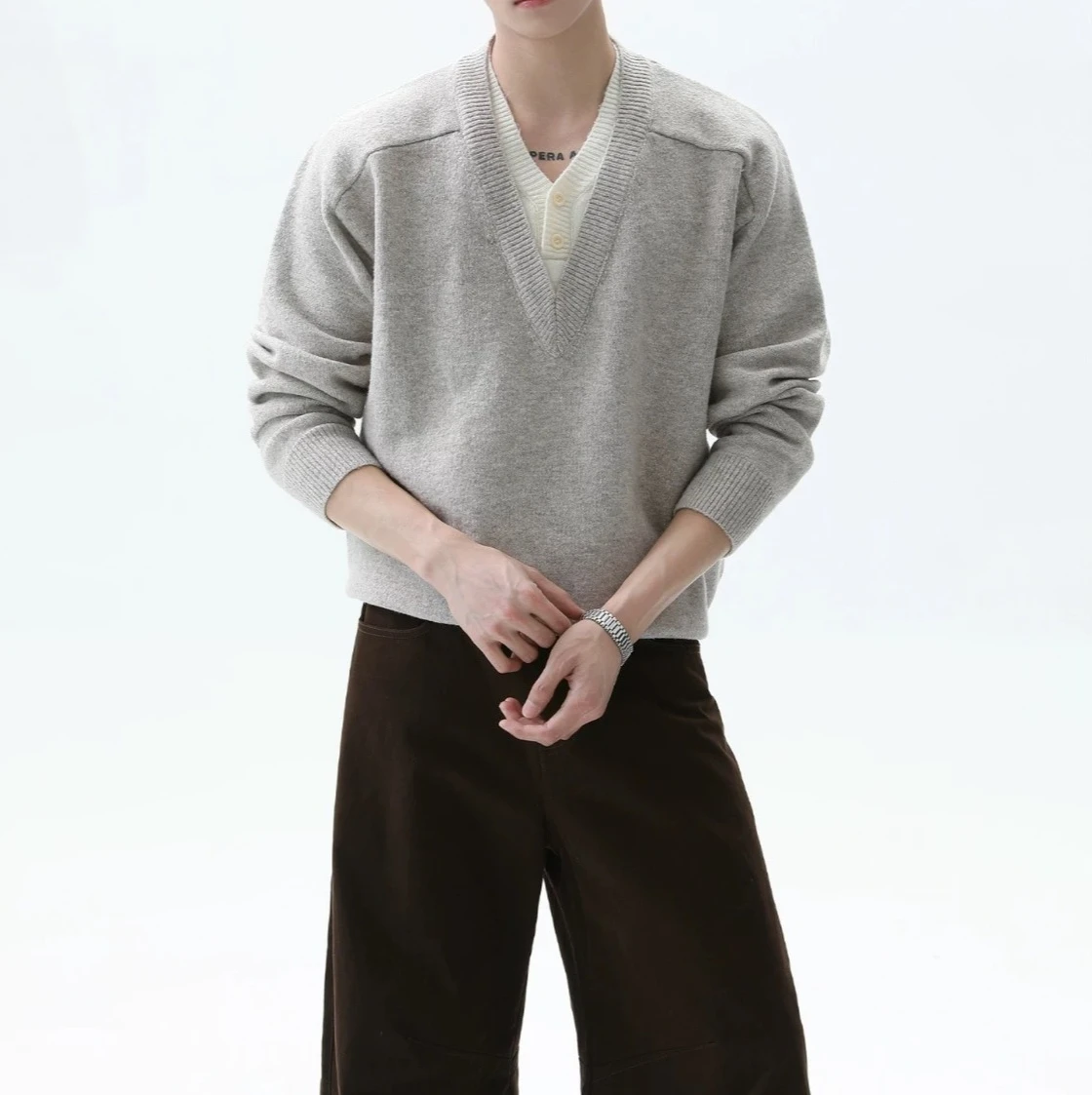 Fake Two-piece Splicing V-neck Sweater Men's 2026 Spring and Autumn New Knitted Bottoming Shirt Top
Fake Two-piece Splicing V-neck Sweater Men's 2026 Spring and Autumn New Knitted Bottoming Shirt Top