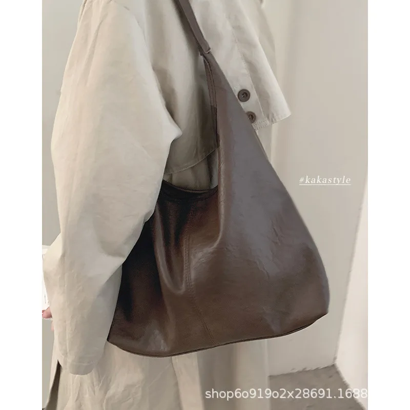 Retro Commuter Women's Bag 2025 New Trendy Fashion Korean Tote Bag Versatile Leisure Large Capacity Underarm Bag
Retro Commuter Women's Bag 2025 New Trendy Fashion Korean Tote Bag Versatile Leisure Large Capacity Underarm Bag