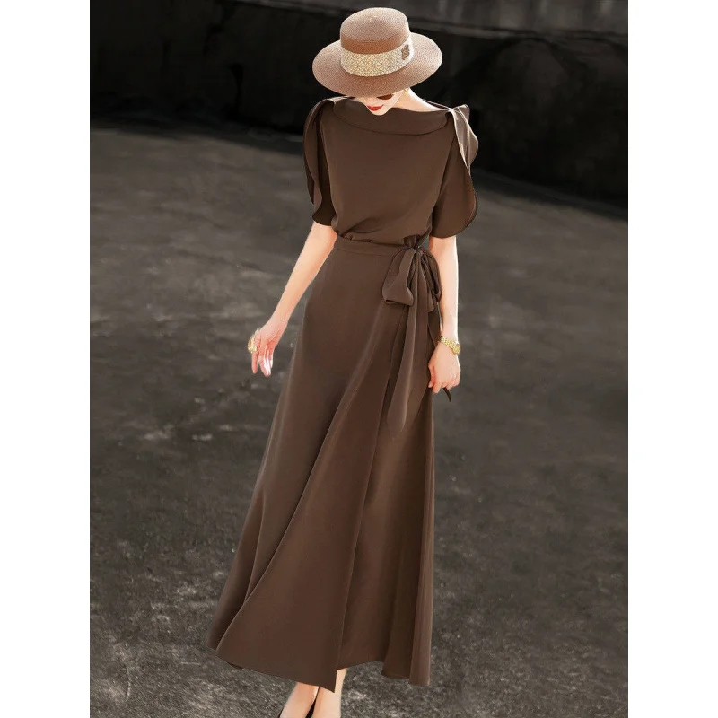 MEXCOCO 2026 Summer Elegant Off Shoulder Fold Neck Puff Sleeve Tie Belt Waist Solid Slim Flowy Maxi Commuter Dress
MEXCOCO 2026 Summer Elegant Off Shoulder Fold Neck Puff Sleeve Tie Belt Waist Solid Slim Flowy Maxi Commuter Dress