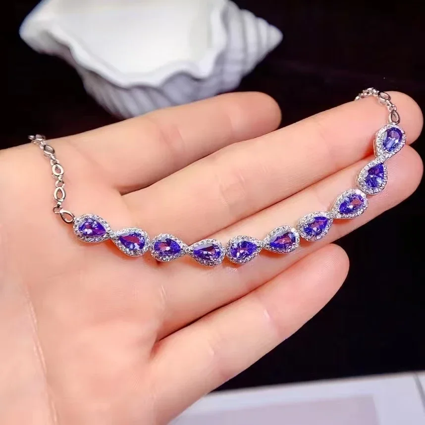 100% Natural Tanzanite Bracelet for Wedding 4mm*6mm Light Blue Pearcut Tanzanite Silver Bracelet 925 Silver Gemstone Bracelet
100% Natural Tanzanite Bracelet for Wedding 4mm*6mm Light Blue Pearcut Tanzanite Silver Bracelet 925 Silver Gemstone Bracelet