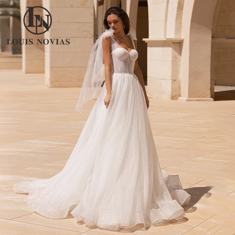 LOUIS NOVIAS свадебное платье на тонких бретельках сексуальное роскошное свадебное платье трапециевидной формы без рукавов с открытой спиной Vestido De Novia
LOUIS NOVIAS свадебное платье на тонких бретельках сексуальное роскошное свадебное платье трапециевидной формы без рукавов с открытой спиной Vestido De Novia