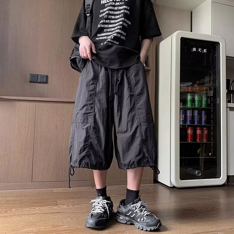 Мужские летние повседневные брюки-капри из тонкого ледяного шелка, свободного кроя, широкие штанины, удобные, из полиэфирного волокна
Мужские летние повседневные брюки-капри из тонкого ледяного шелка, свободного кроя, широкие штанины, удобные, из полиэфирного волокна