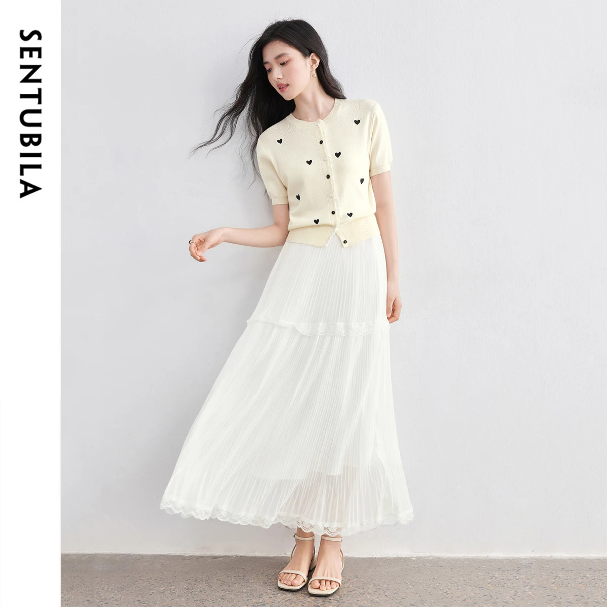 SENTUBILA Woman Summer Beige Knitted Suit 2025 Short Sleeve Cardigan Tops Pleated Skirts Two-Piece Casual Ladies Sets W52ZC2361
SENTUBILA Woman Summer Beige Knitted Suit 2025 Short Sleeve Cardigan Tops Pleated Skirts Two-Piece Casual Ladies Sets W52ZC2361