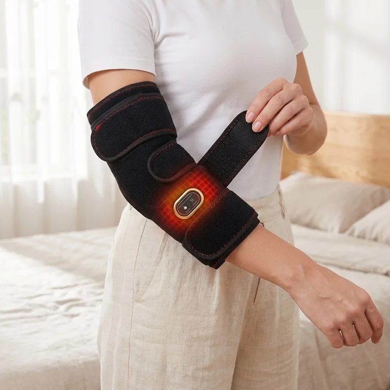 Massage Elbow Brace Wrap with Therapeutic Heating Pad Compression Support for Tennis Golfer Elbow Arthritis Joint Pain Relief
Massage Elbow Brace Wrap with Therapeutic Heating Pad Compression Support for Tennis Golfer Elbow Arthritis Joint Pain Relief